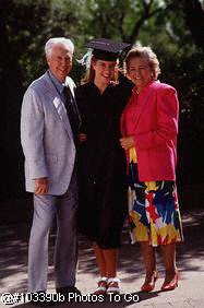 Grandparents w/ granddaughter on graduation